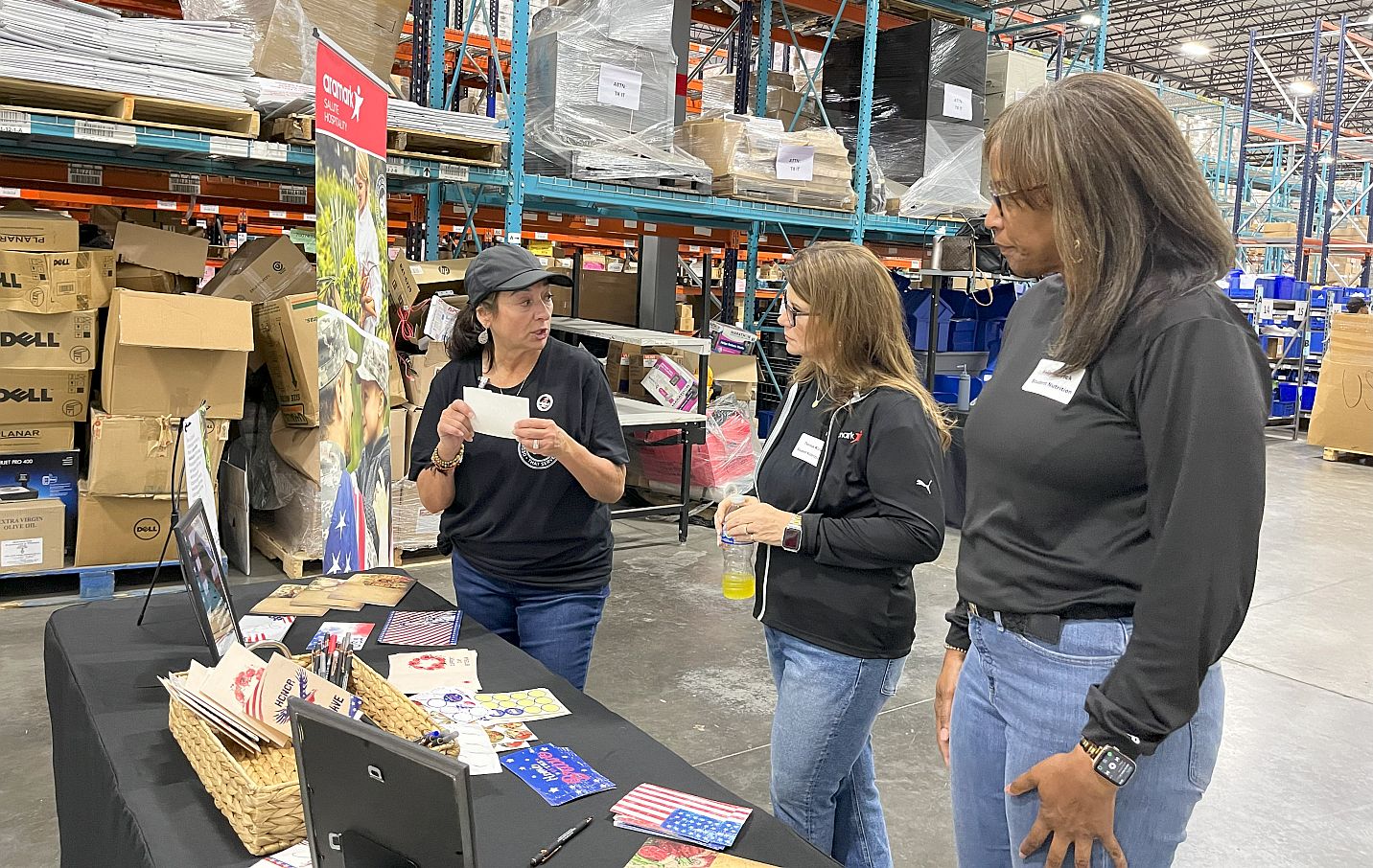 employees creating care packages for military members